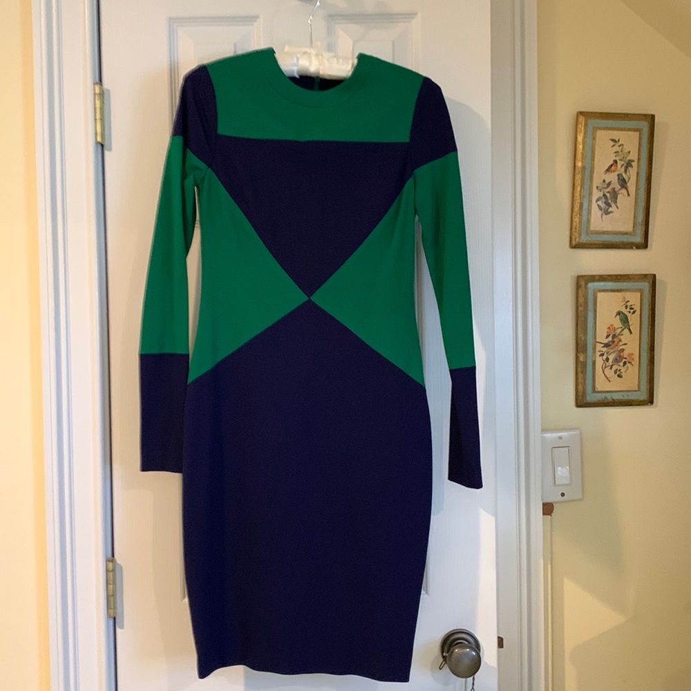 Dress w/ geometric color inserts. Elasticized knit. Quality workmanship/fabric